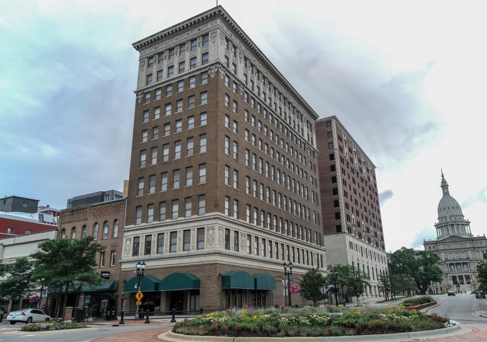 The building on the southwest corner of Washington Square and Michigan Avenue would be renovated to include apartments with the lower levels turned into a parking ramp. Photo: Sunday, Aug. 6, 2023.