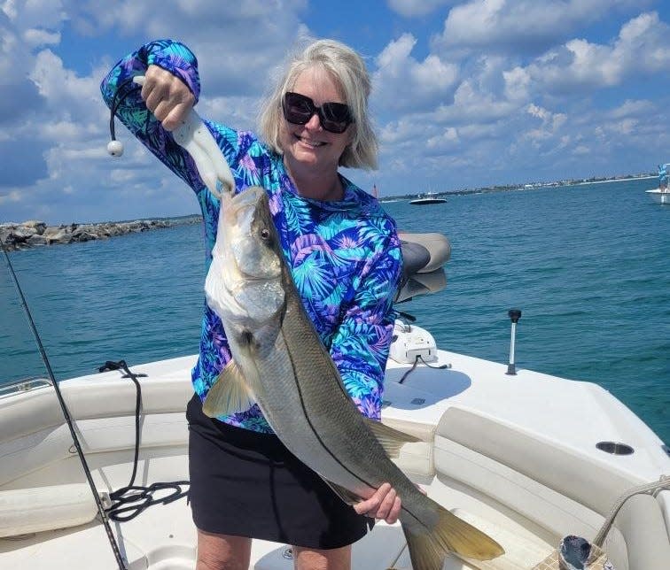 Michele Glazier, of Ormond Beach, caught (and released) this 38-inch snook at Ponce Inlet.