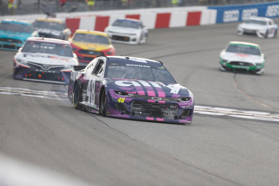 Alex Bowman (48) crosses the finish line to win the Toyota Owners 400 at Richmond Raceway on April 18, 2021.