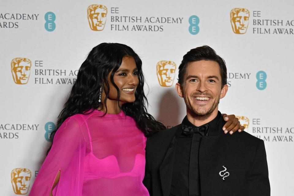 British actress Simone Ashley and British actor Jonathan Bailey pose in the winner's room during the BAFTA British Academy Film Awards ceremony at the Royal Albert Hall, in London, on March 13, 2022. (AFP via Getty Images)