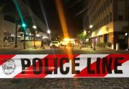 <p>This photo shows a police car behind police tape blocking a street leading to the Jacksonville Landing area in downtown Jacksonville, Fla., Aug. 26, 2018. (Photo: Joe Raedle/Getty Images) </p>