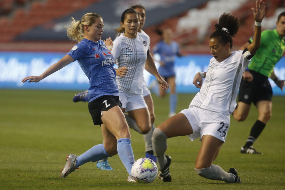 Chicago Red Stars' Kealia Watt (2) and Sky Blue's Estelle Johnson (24) battle for the ball during the first half of an NWSL Challenge Cup soccer semifinal match Wednesday, July 22, 2020, in Sandy, Utah. (AP Photo/Rick Bowmer)
