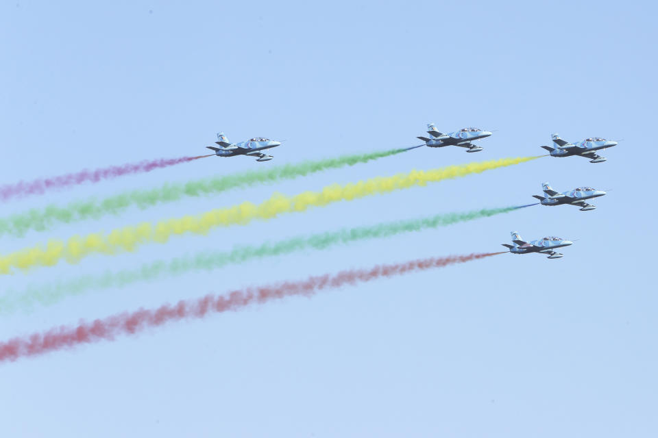 Myanmar fighter jets perform in the sky during a ceremony marking Myanmar's 75th anniversary of Independence Day in Naypyitaw, Myanmar, Wednesday, Jan. 4, 2023. Myanmar's ruling military leader, Senior Gen. Min Aung Hlaing, on Wednesday described plans for an election later this year and called for national unity in a speech as he led a ceremony marking the 75th anniversary of independence from Britain. (AP Photo/Aung Shine Oo)