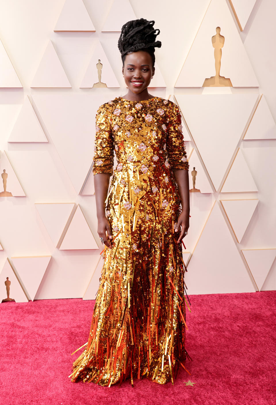 Lupita Nyong'o on the 2022 Oscars red carpet. (Getty Images)