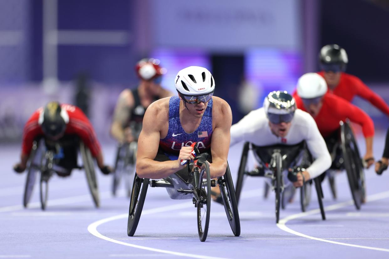 PARIS, FRANCE - AUGUST 31: Daniel Romanchuk of Team United States wins Gold in the Para Athletics Men's 5000m - T54 Final on day three of the Paris 2024 Summer Paralympic Games at Stade de France on August 31, 2024 in Paris, France. (Photo by Michael Steele/Getty Images)