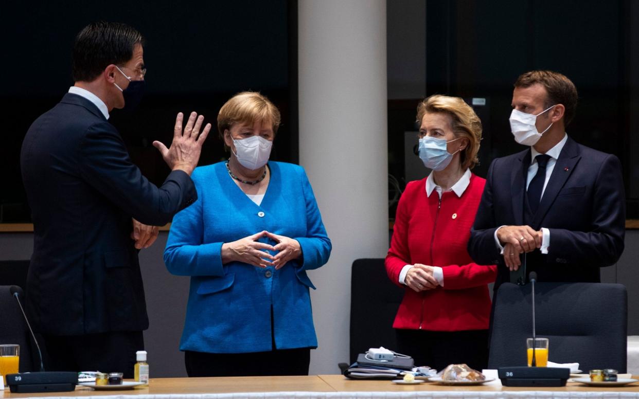 From left: Dutch Prime Minister Mark Rutte, German Chancellor Angela Merkel, European Commission President Ursula von der Leyen and French President Emmanuel Macron speak on she second day of the EU summit in Brussels. - Francisco Seco/Shutterstock 