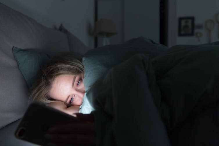 <span class="caption">FOMO keeping you up at night?</span> <span class="attribution"><a class="link " href="https://www.shutterstock.com/image-photo/portrait-young-sleepy-tired-woman-lying-1053130604" rel="nofollow noopener" target="_blank" data-ylk="slk:Shutterstock.;elm:context_link;itc:0;sec:content-canvas">Shutterstock.</a></span>