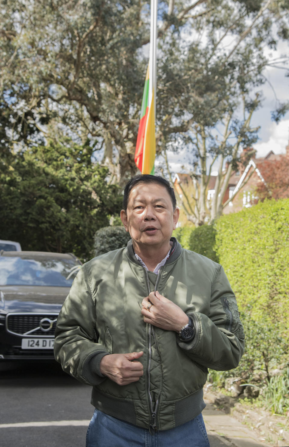 Myanmar's former ambassador to the UK, Kyaw Zwar Minn, speaks to the press outside his residence in north west London, Thursday, April 15, 2021. Myanmar’s ambassador to the United Kingdom, who criticized the military coup in his country, was locked out of his London office by colleagues. Kyaw Zwar Minn said he was barred from entering the embassy last week by diplomats loyal to the military regime. (Ian West/PA via AP)