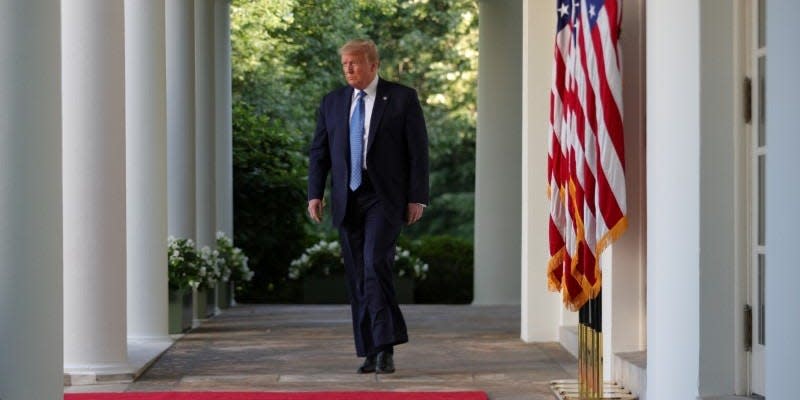 FILE PHOTO: U.S. President Donald Trump walks out of the Oval Office to deliver a statement on the ongoing protests over racial inequality in the wake of the death of George Floyd while in Minneapolis police custody, in the Rose Garden at the White House in Washington, U.S., June 1, 2020. REUTERS/Tom Brenner