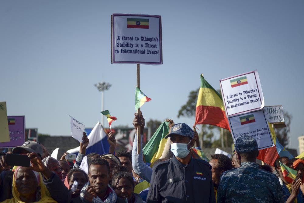 Ethiopians protest against what they say is interference by outsiders in the country’s internal affairs and against the Tigray People’s Liberation Front (TPLF), the party of Tigray’s fugitive leaders, at a rally organized by the city administration in the capital Addis Ababa, Ethiopia Saturday, Oct. 22, 2022. (AP Photo)