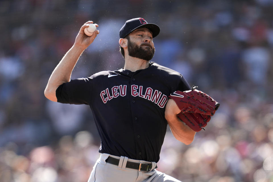 Cleveland Guardians pitcher Lucas Giolito throws against the Detroit Tigers in the first inning of a baseball game, Sunday, Oct. 1, 2023, in Detroit. (AP Photo/Paul Sancya)