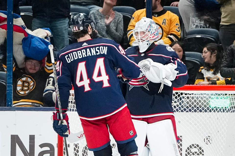 Nov 27, 2023; Columbus, Ohio, USA; Columbus Blue Jackets defenseman Erik Gudbranson (44) congratulates goaltender Spencer Martin (30) following the 5-2 win over the Boston Bruins in the NHL game at Nationwide Arena.