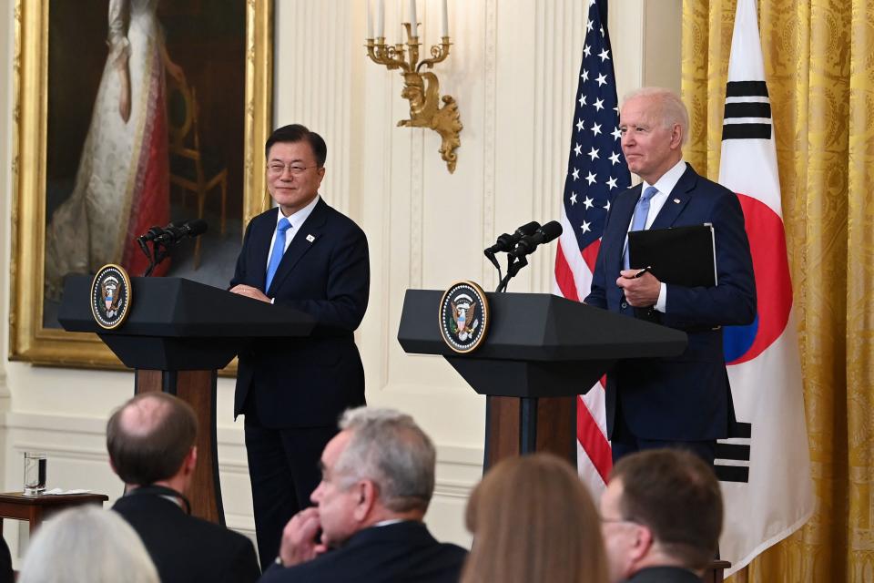 US President Joe Biden (R) and South Korean President Moon Jae-in participate in a press conference in the East Room of the White House in Washington, DC on May 21, 2021. (Photo by Brendan SMIALOWSKI / AFP) (Photo by BRENDAN SMIALOWSKI/AFP via Getty Images)
