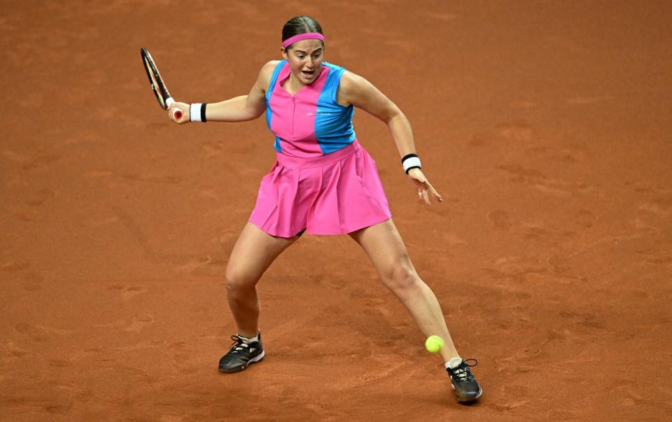 Jelena Ostapenko in action during her round of 32 match against Britain's Emma Raducanu - Reuters/Angelika Warmuth