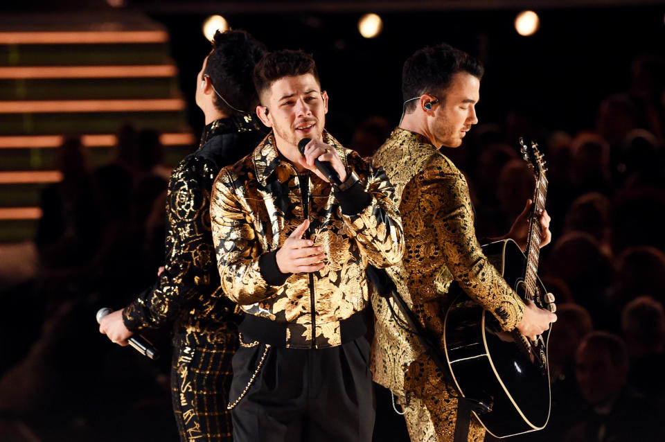LOS ANGELES, CALIFORNIA - JANUARY 26: (L-R) Joe Jonas, Nick Jonas, and Kevin Jonas of music group Jonas Brothers perform onstage during the 62nd Annual GRAMMY Awards at STAPLES Center on January 26, 2020 in Los Angeles, California. (Photo by Kevin Winter/Getty Images for The Recording Academy )