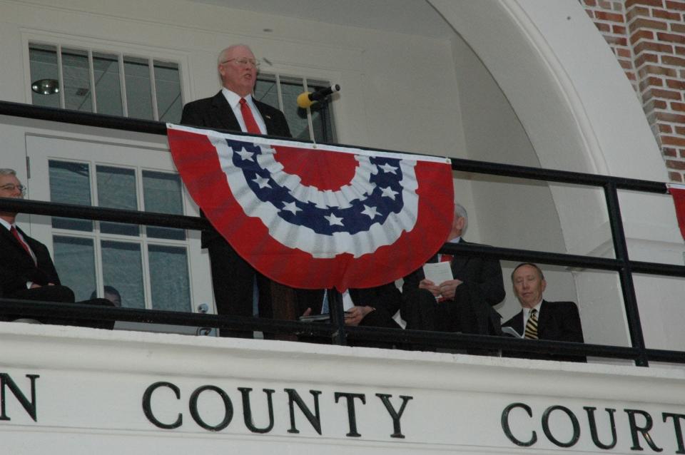 Randolph Murdaugh III speaks from the balcony of the Hampton County Courthouse during a rededication ceremony for the renovated courthouse.