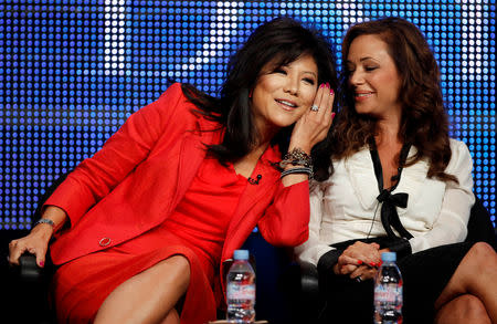 FILE PHOTO: Co-hosts Julie Chen (L) and Leah Remini joke during the CBS, Showtime and the CW Television Critics Association press tour in Beverly Hills, California, U.S., July 28, 2010. REUTERS/Lucy Nicholson/File Photo