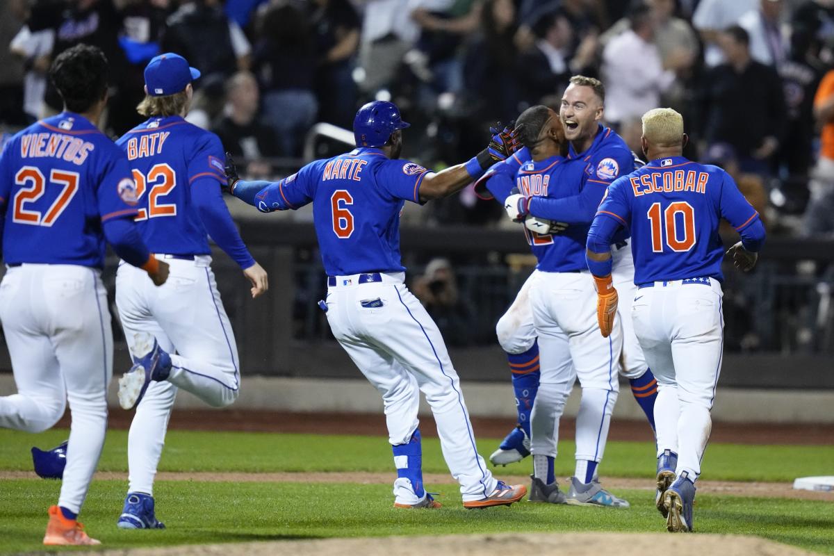 Mets rally to beat Athletics 4-3 in 10 innings