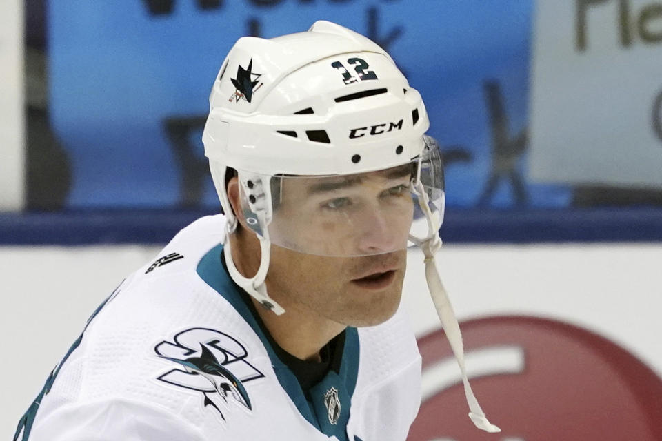 FILE - In this Oct. 25, 2019, file photo, San Jose Sharks' Patrick Marleau warms up prior to an NHL hockey game against the Toronto Maple Leafs in Toronto. Marleau will get another shot at winning a Stanley Cup after being traded by the San Jose Sharks to the Pittsburgh Penguins on Monday, Feb. 24, 2020, for a conditional draft pick. The struggling Sharks will get a 2021 third-round pick from the Penguins for Marleau that becomes a second-rounder if Pittsburgh wins the title this year.(Hans Deryk/The Canadian Press via A, File)