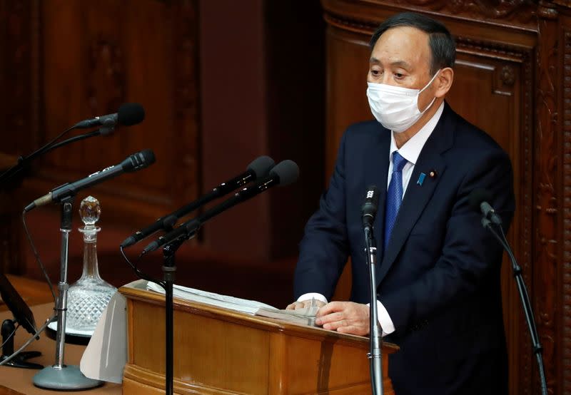 Japan's Prime Minister Yoshihide Suga delivers his policy speech at the opening of the Lower House parliamentary session in Tokyo