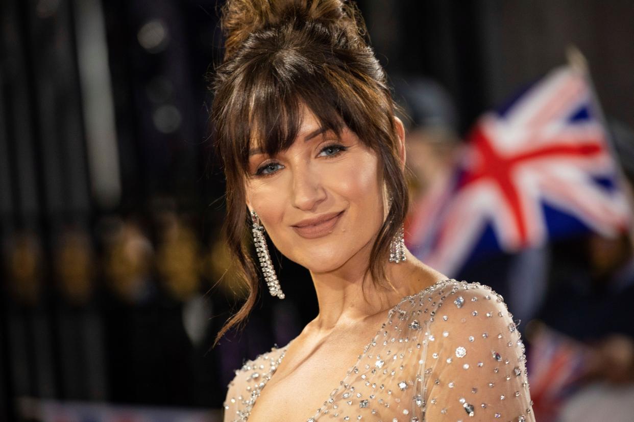 Catherine Tyldesley poses for photographer upon arrival at the Pride of Britain Awards on Saturday, Oct. 30, 2021 in London. (Photo by Vianney Le Caer/Invision/AP)