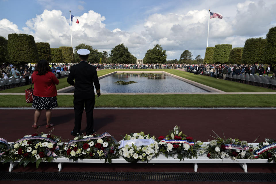 Wreath of flowers are displayed as French and international visitors attend the 78th anniversary of D-Day ceremony, in the Normandy American Cemetery and Memorial of Colleville-sur-Mer, overlooking Omaha Beach, Monday, June, 6, 2022. The ceremonies pay tribute to the nearly 160,000 troops from Britain, the U.S., Canada and elsewhere who landed on French beaches on June 6, 1944, to restore freedom to Europe after Nazi occupation. (AP Photo/ Jeremias Gonzalez)