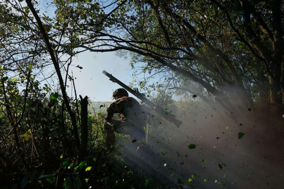 PHOTO: Members of the SPG-9 anti tank recoilless gun crew fires the gun onto Russian positions near the occupied Ukrainian city of Bakhmut on Aug. 14, 2023 in Donetsk Oblast, Ukraine. (Roman Chop/Global Images Ukraine via Getty Images)