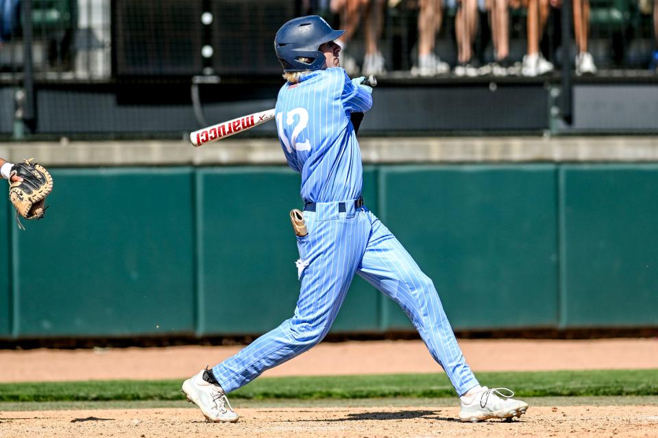 Maple Valley's Ayden Wilkes gets a hit against Beal City in the fifth inning on Friday, June 14, 2024, during the D4 baseball state semifinal at MSU's McLane Stadium in East Lansing.