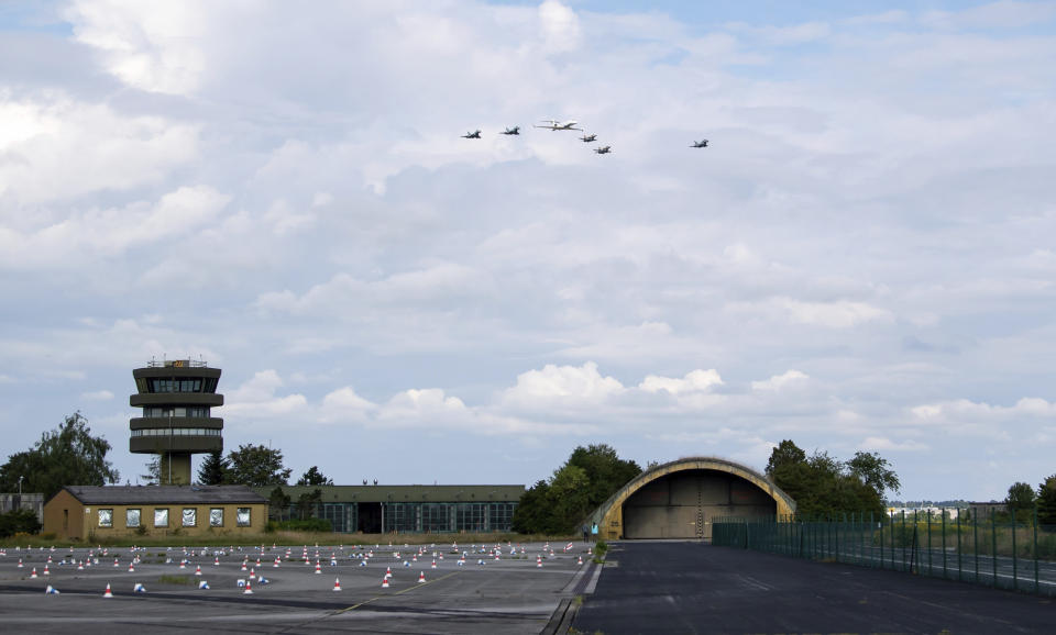 German air force Bundeswehr Eurofighters and an Israeli Air Force jets fly in formation over the Fuerstenfeldbruck airbase in commemoration of the 1972 Olympic Games assassination attempt in Fuerstenfeldbruck, Germany, Tuesday, Aug. 18, 2020. The attempt to rescue the hostages failed at the airbase in Fuerstenfeldbruck in 1972and the hostages perished. It is the Israeli Air Force's first time conducting joint air combat exercises in Germany. (Sven Hoppe/dpa via AP)