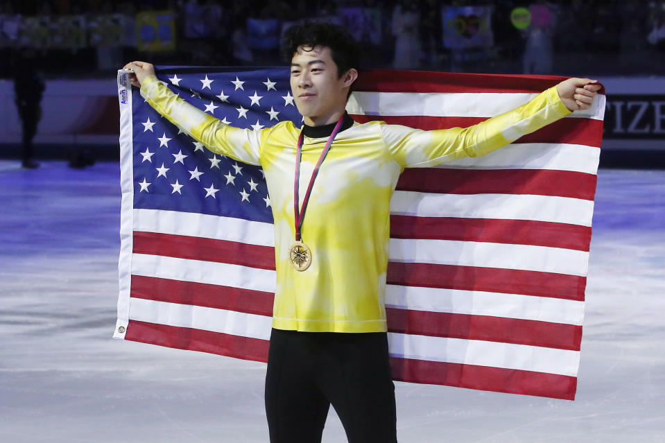 FILE - In this Dec. 7, 2019, file photo, United States' Nathan Chen celebrates after winning the men's free skate of the figure skating Grand Prix finals at the Palavela ice arena, in Turin, Italy. Chen, master of the quad, is on the verge of skating off with his fourth consecutive title at the U.S. Championships this week. He says such an achievement is not front and center in his mind. (AP Photo/Antonio Calanni, File)