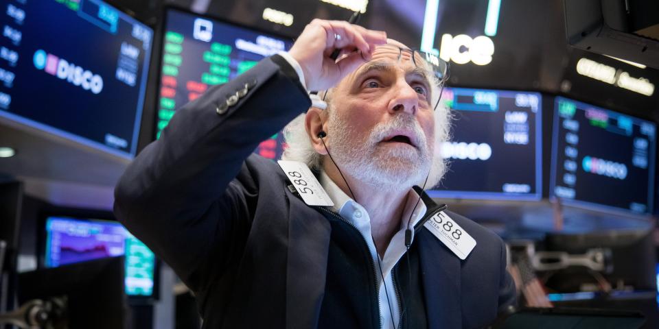 A trader works at the New York Stock Exchange NYSE