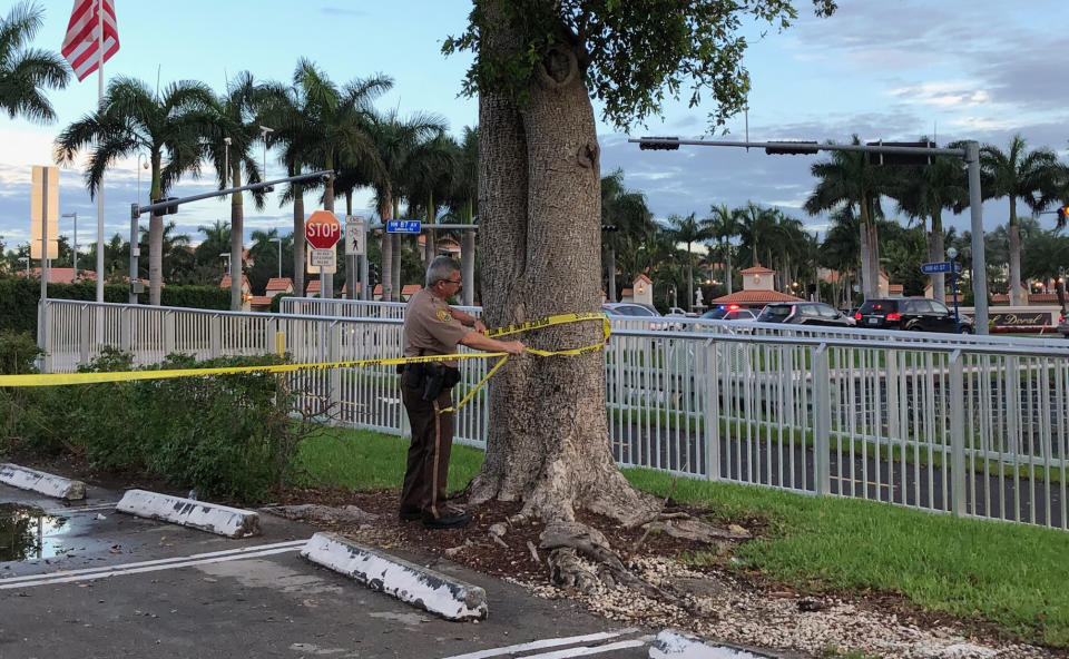 <em>Police tape off an area by the Trump National Doral resort after reports of a shooting inside the resort (Picture: AP)</em>