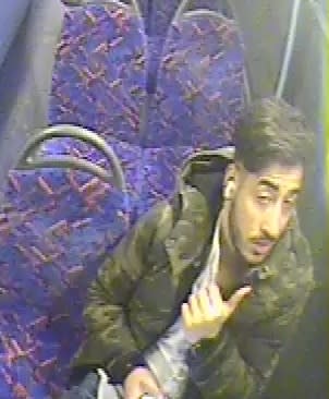 Police hunt man who spat at bus driver