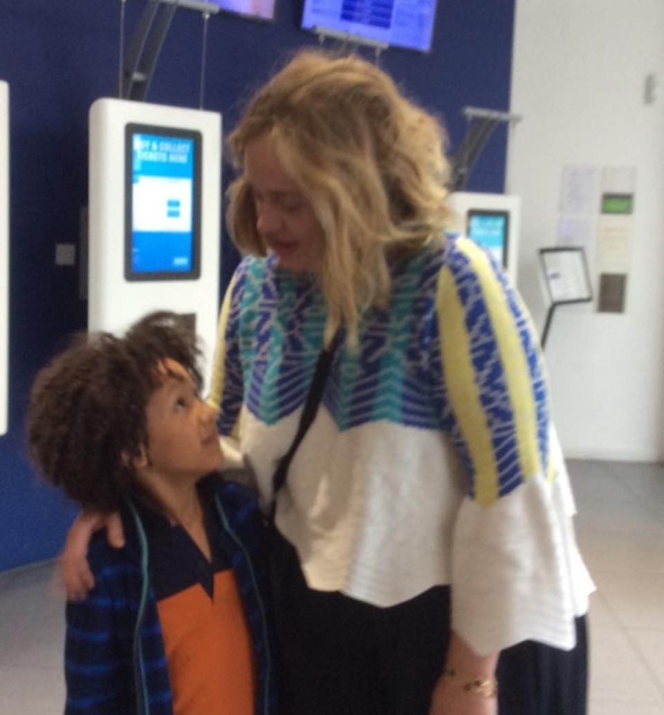 Adele with one of the young survivors at the cinema. Copyright: [Instagram]