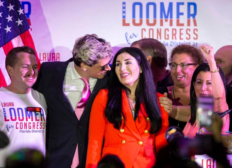 Republican congressional candidate Laura Loomer celebrates with Milo Yiannopoulos (left) and campaign director Karen Giorno (right) at a 2020 primary election night event in West Palm Beach.