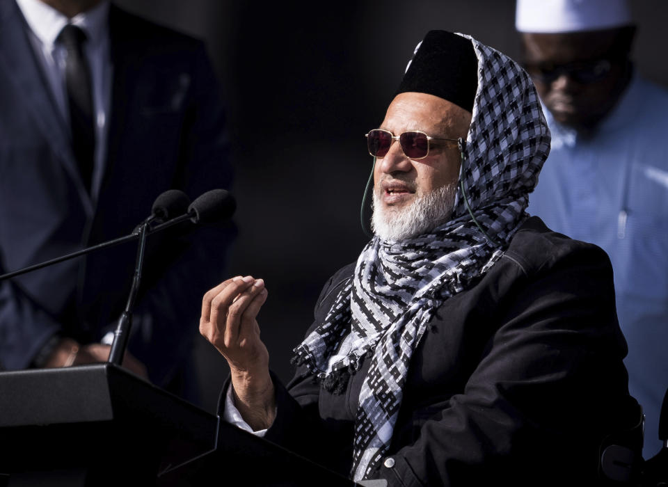 In this photo supplied by the New Zealand government, Mosque shooting survivor Farid Ahmed addresses the national remembrance service in Hagley Park for the victims of the March 15 mosques terrorist attack in Christchurch, New Zealand, Friday, March 29, 2019. (Mark Tantrum/New Zealand Government via AP)