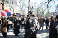<p>A woman dressed as Lady Liberty walks with other protesters dressed in black around Washington Square Park at the “Mock Funeral for Presidents’ Day” rally in New York City on Feb. 18, 2017. (Gordon Donovan/Yahoo News) </p>