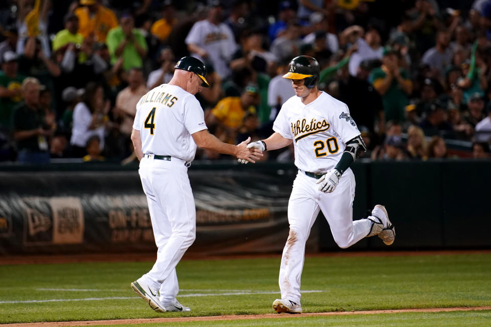 The unpredictability of baseballs going forward will make it hard to evaluate the numbers of players like Oakland's Mark Canha (20). (Photo by Daniel Shirey/MLB Photos via Getty Images)