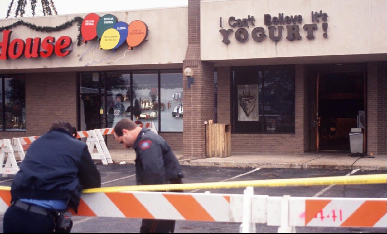 Austin Police Department officers guard the scene of the yogurt shop murders Dec. 7, 1991.