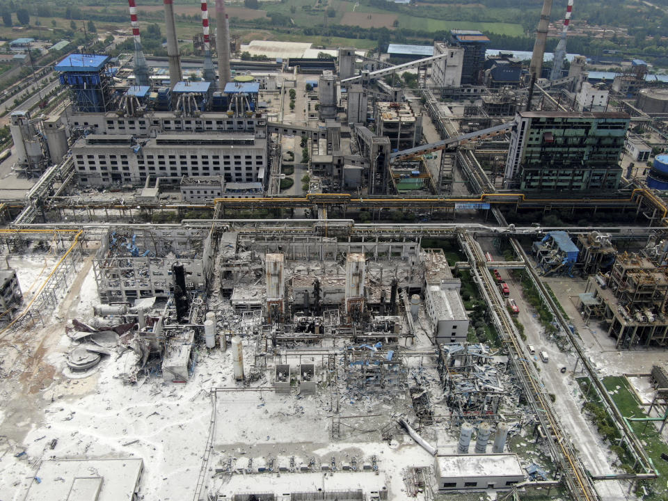 An aerial view shows the aftermath of the blast at a gas plant in Yima city in central China's Henan province Saturday, July 20, 2019. The Friday evening explosion shattered windows 3 kilometers (1.9 miles) away, and knocked off doors inside buildings, killing some and injuring others. (Chinatopix via AP)