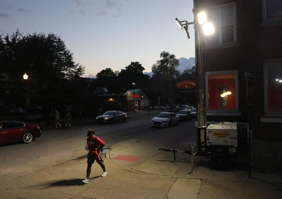 Ohio State has invested in mobile lighting units  to light up high traffic walkways at night near the campus.. Mobile lights brighten up the corner of E 12th Ave. and  N. Pearl St. on Friday, October 8, 2021.