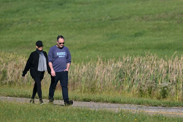 Kamala Harris went for a walk with husband Doug Emhoff during a break in debate preparations (Mandel NGAN)