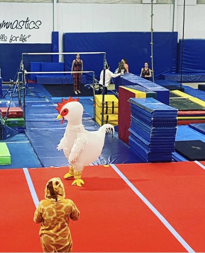 A kid dressed as a chicken