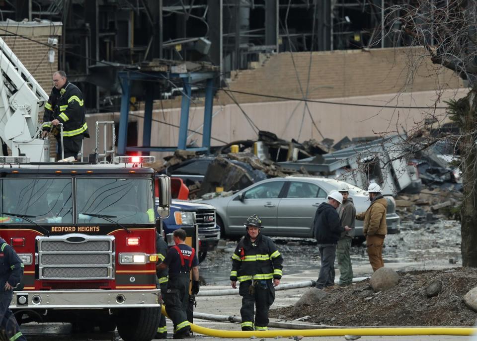 Firefighters begin to pack up gear at the I. Schumann & Co. metals plant after an explosion at the factory in Bedford, Ohio (REUTERS)