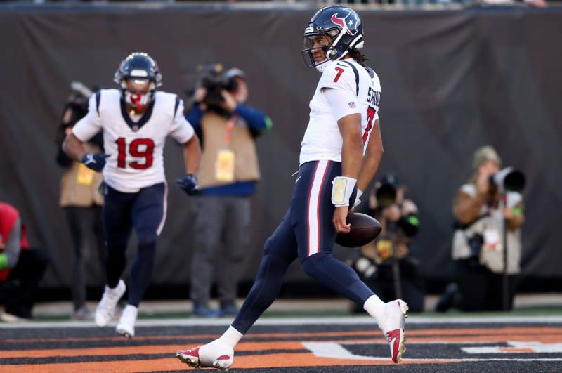 Houston Texans quarterback C.J. Stroud (R) celebrates a touchdown against the Cincinnati Bengals on Sunday at Paycor Stadium in Cincinnati. Photo by John Sommers II/UPI