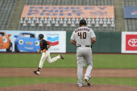 Arizona Diamondbacks starting pitcher Madison Bumgarner walks on the mound after giving up a home run to San Francisco Giants' Evan Longoria, left, during the second inning of a baseball game Saturday, Sept. 5, 2020, in San Francisco. (AP Photo/Eric Risberg)