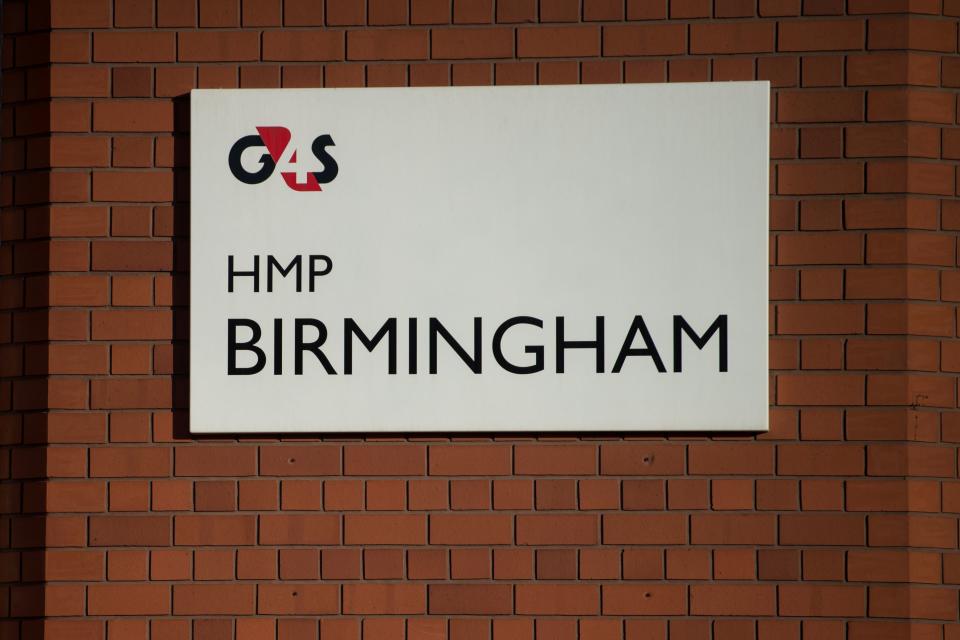 The sign for ‘G4S HMP BIRMINGHAM’ is pictured at the entrance to HMP Birmingham in Winson Green, Birmingham, central England on December 17, 2016. Photo: OLI SCARFF/AFP/Getty Images