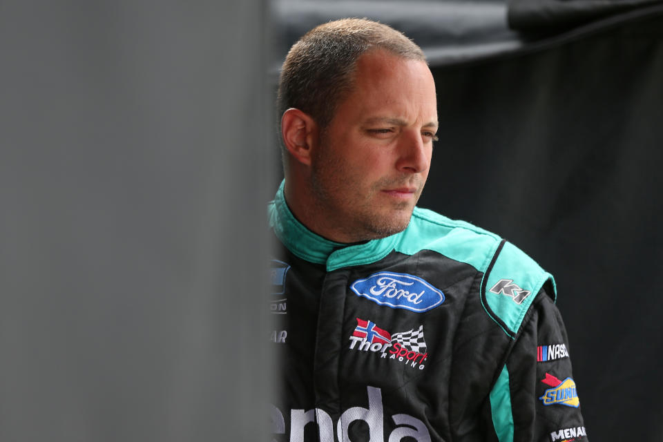 NEWTON, IOWA - JUNE 15: Johnny Sauter, driver of the #13 Tenda Products Ford, stands by his truck during practice for the NASCAR Gander Outdoor Truck Series M&M'S 200 at Iowa Speedway on June 15, 2019 in Newton, Iowa. (Photo by Matt Sullivan/Getty Images)