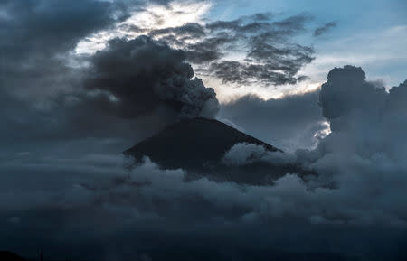 Indonesia's Mount Agung volcano erupts for a second time in less than a week as seen from the coastal town of Amed, in Bali, Indonesia November 25, 2017. REUTERS/Petra Simkova