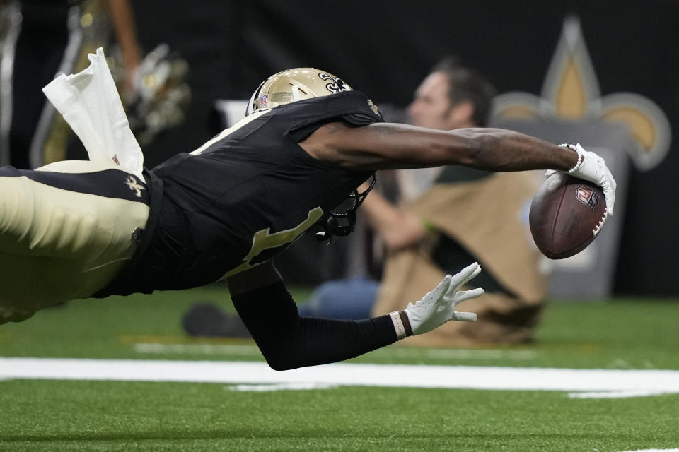 New Orleans Saints wide receiver A.T. Perry (17) scores a touchdown in the first half of a preseason NFL football game against the Kansas City Chiefs in New Orleans, Sunday, Aug. 13, 2023. (AP Photo/Gerald Herbert)